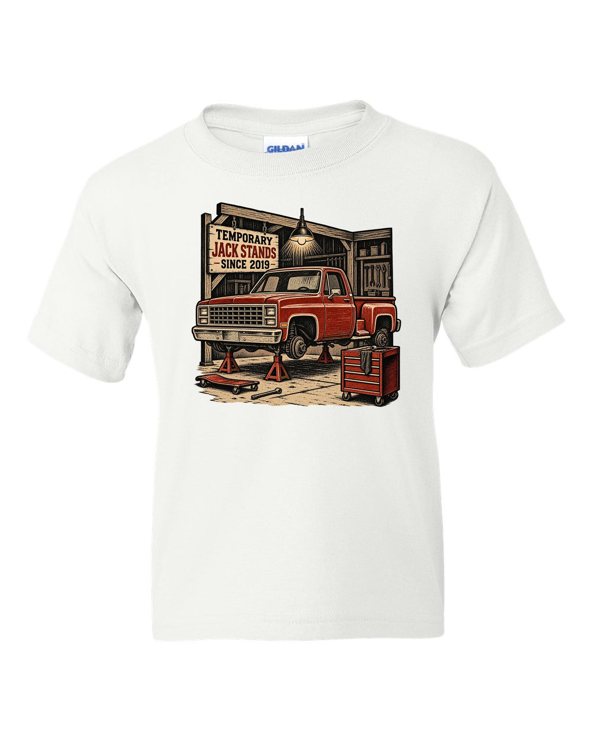 Linocut woodcut style print of a 1973-87 Chevrolet C10 Squarebody Stepside in a workshop with jack stands lettering white kids tee front view with the design
