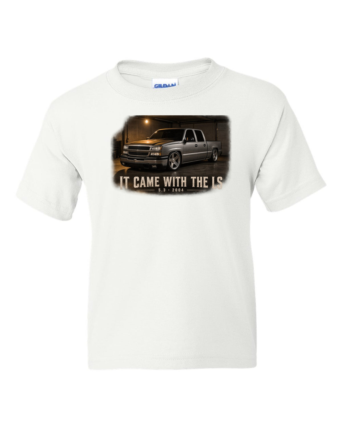 2004 Chevy Silverado crew cab in a garage night scene, print white kids tee front view with the design