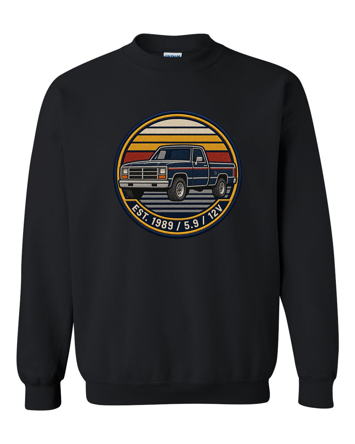 Varsity-style grille crest print of a 1989-1993 Dodge Ram 1st gen with Est. 1989 5.9 12V text black crewneck front view with the design