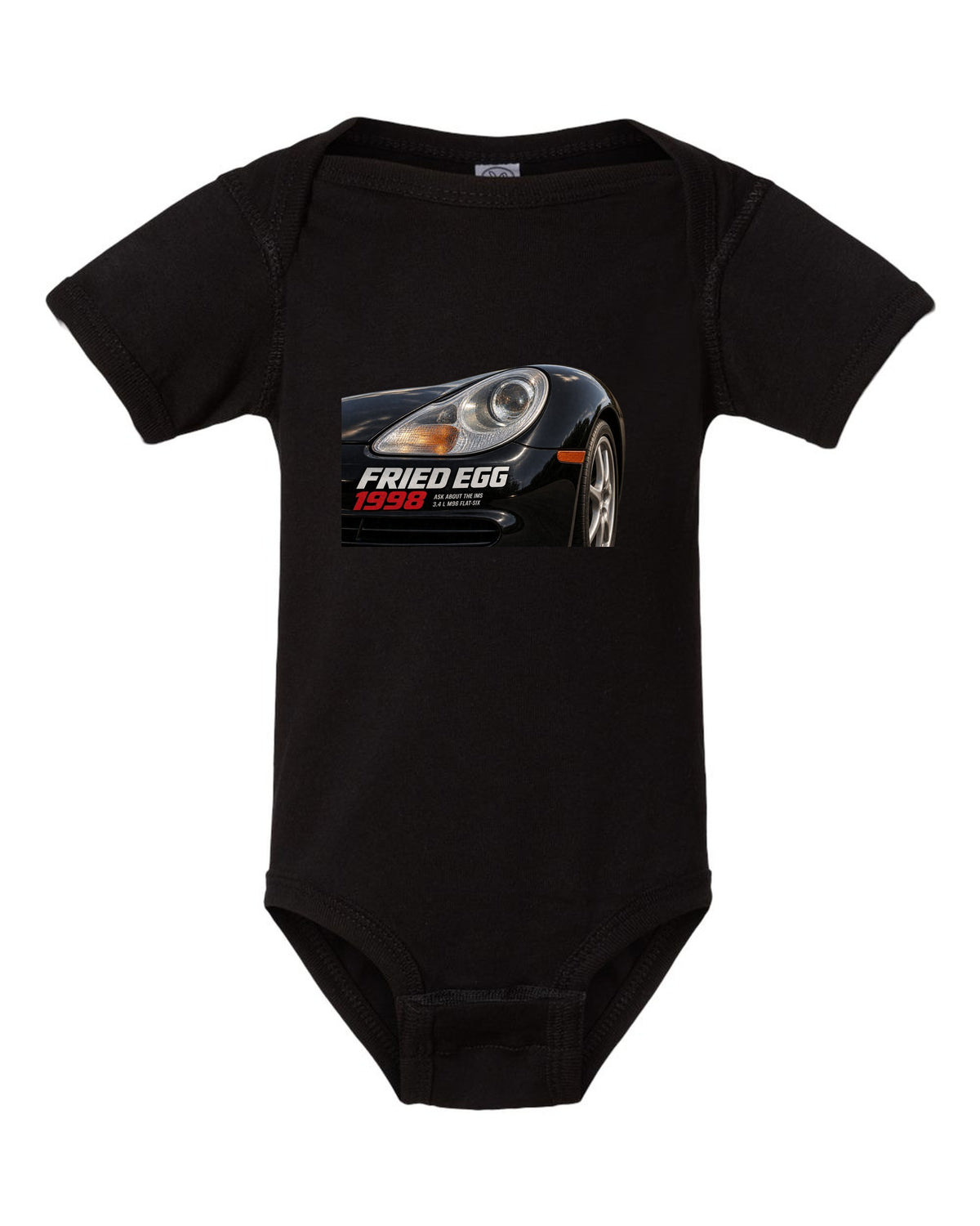 Close-up detail print of the Porsche 911 996 Fried Egg lamp with IMS joke text black baby onesie front view with the design
