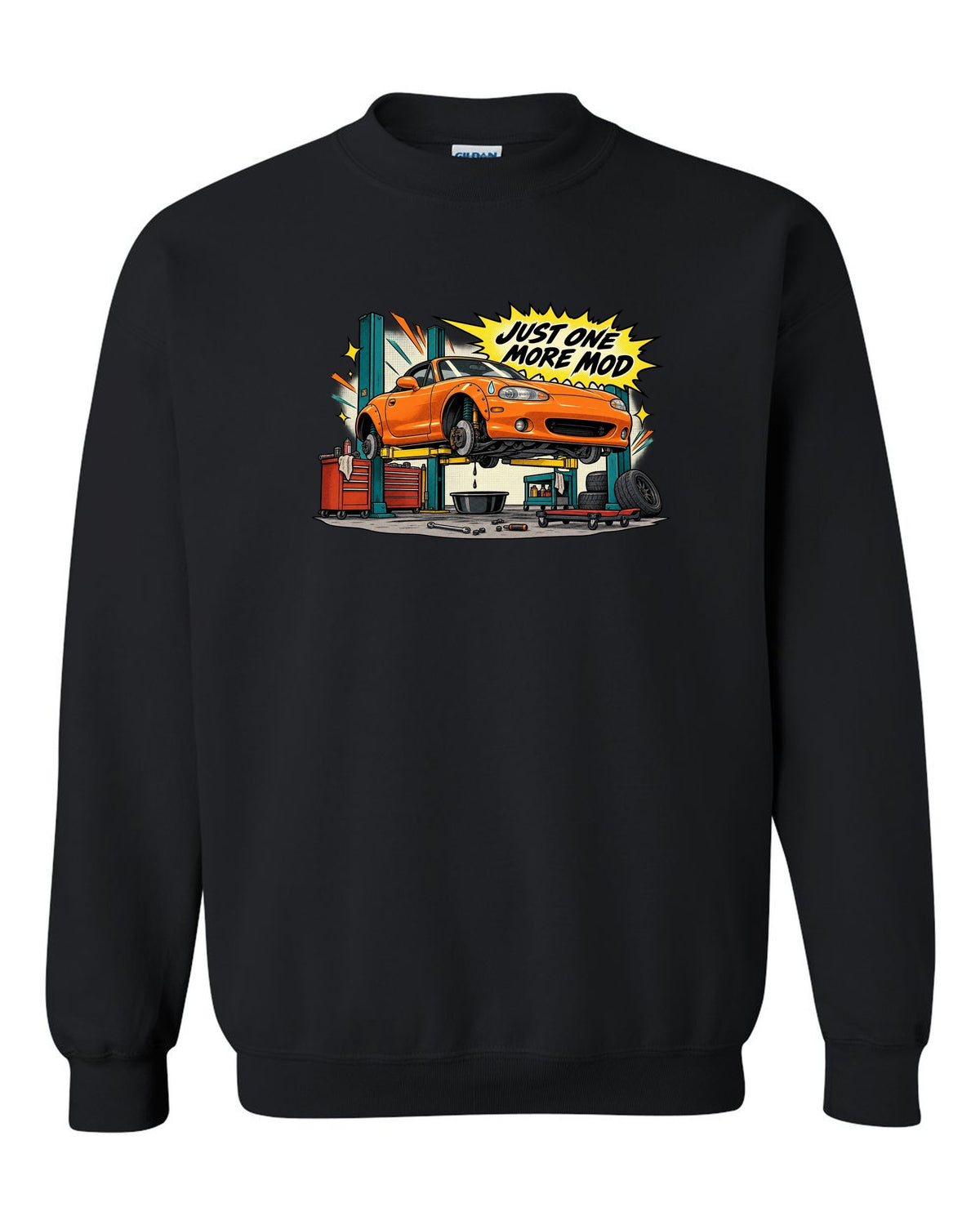 Retro manga halftone panel print of a Mazda MX-5 NB in a workshop with the text Just One More Mod black crewneck front view with the design