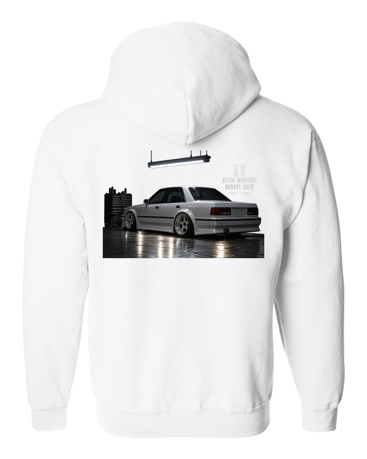 print of a Mercedes W124 300E 5.6 Hammer in a night garage with the text 5.6 After Midnight Nobody Knew white zip hoodie back view with the design