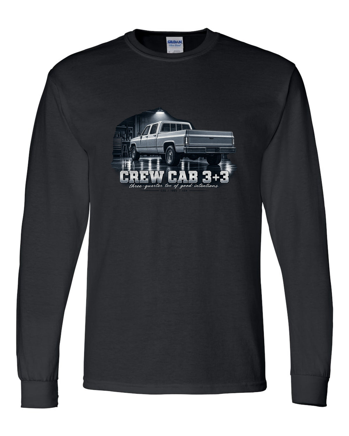 1985 C20 Squarebody crew cab in a garage night scene, print black long sleeve front view with the design