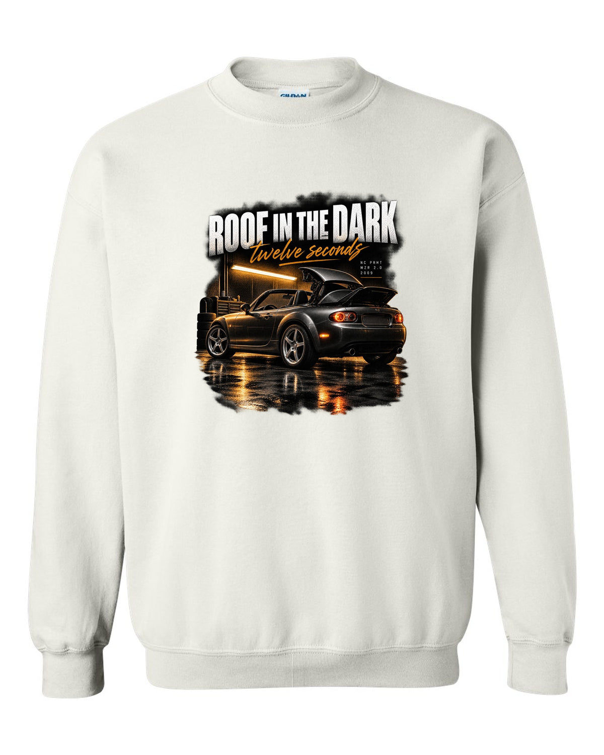 Garage night print of a Mazda MX-5 NC PRHT with the roof folding white crewneck front view with the design