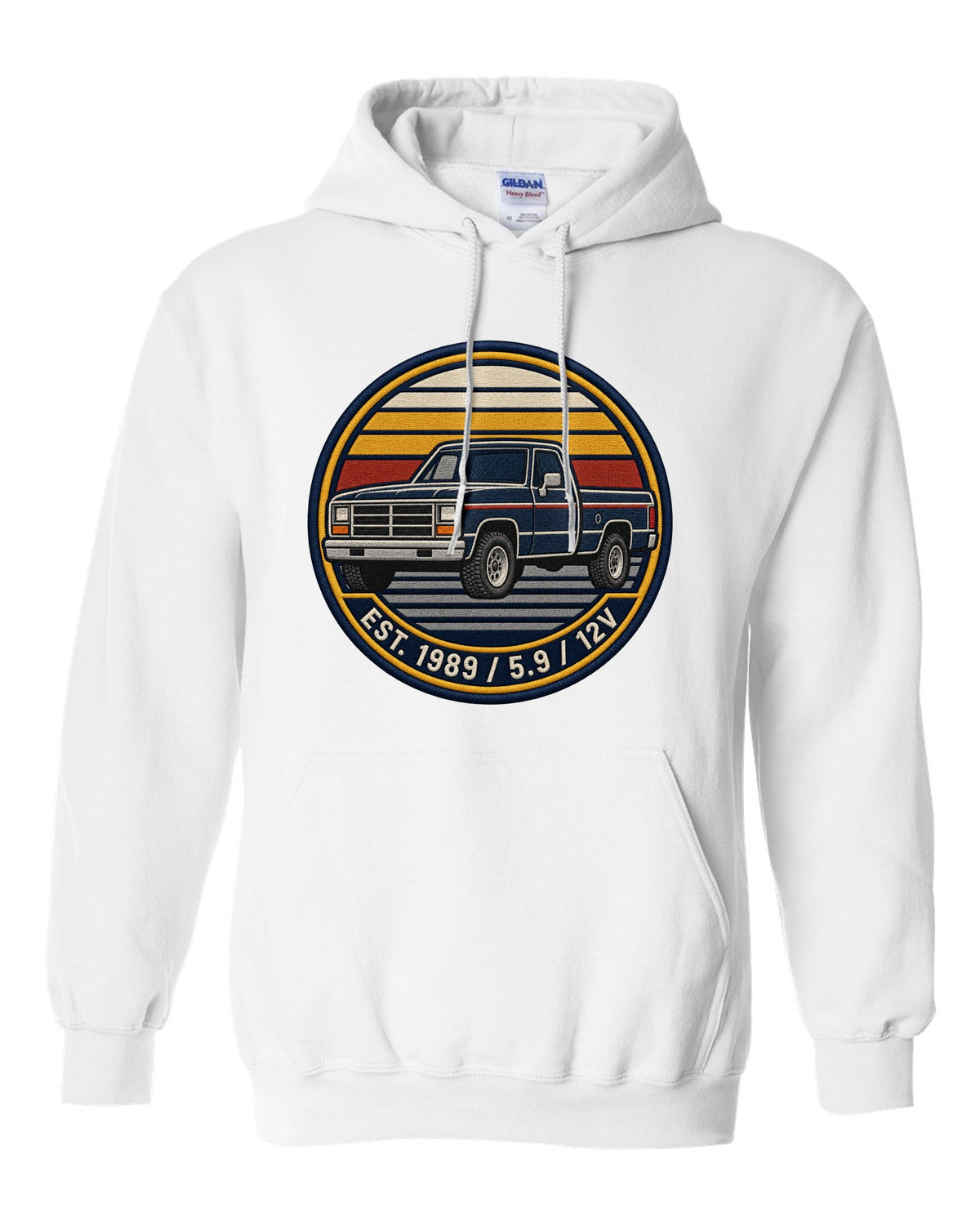 Varsity-style grille crest print of a 1989-1993 Dodge Ram 1st gen with Est. 1989 5.9 12V text white pull over hoodie front view with the design