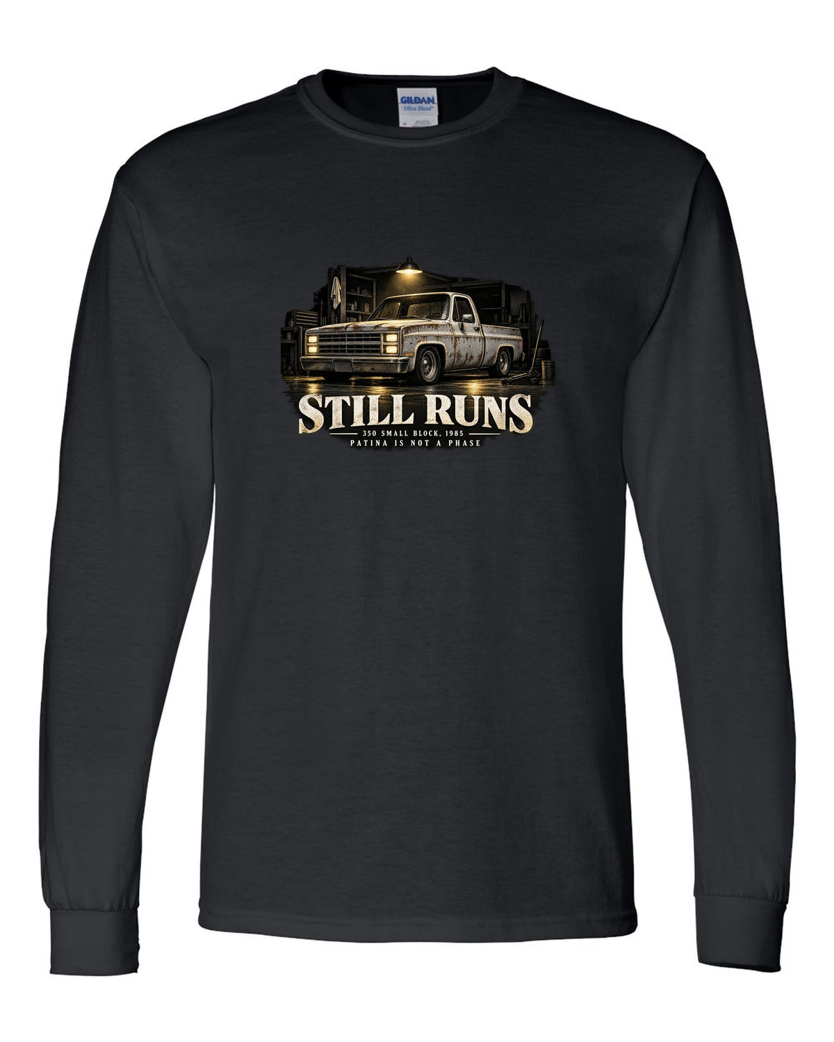 Night garage print of a 1973-87 Chevrolet C10 Squarebody with 350 small block text black long sleeve front view with the design