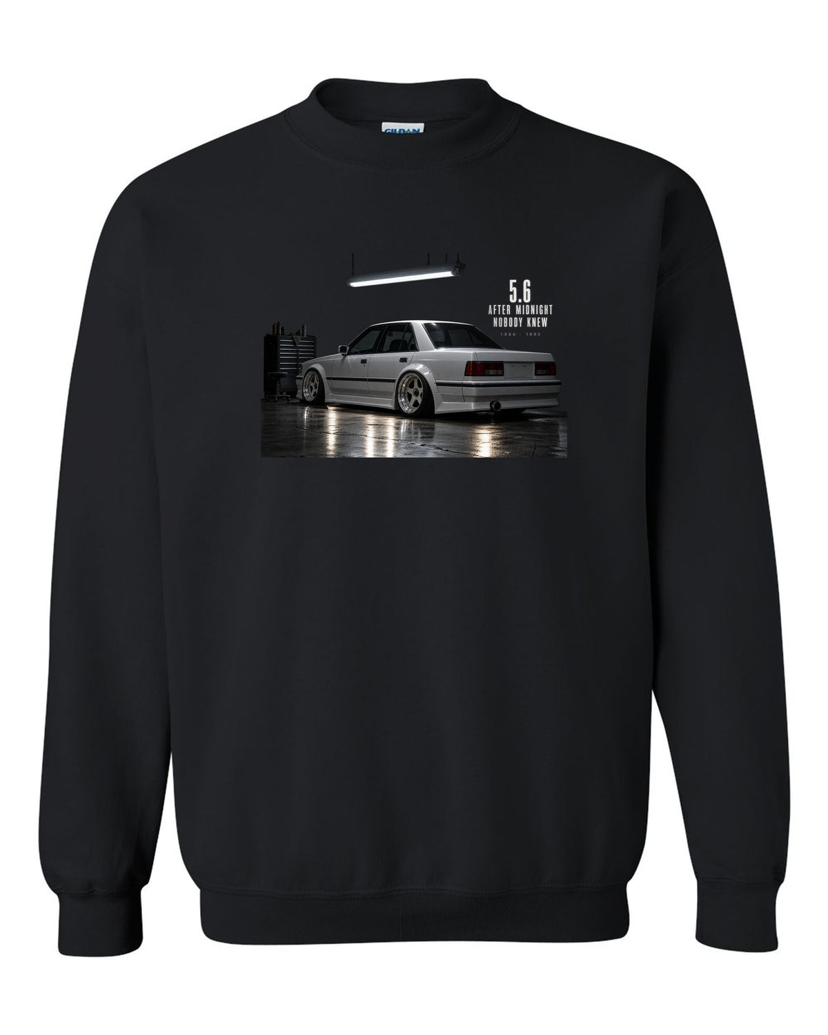 print of a Mercedes W124 300E 5.6 Hammer in a night garage with the text 5.6 After Midnight Nobody Knew black crewneck front view with the design