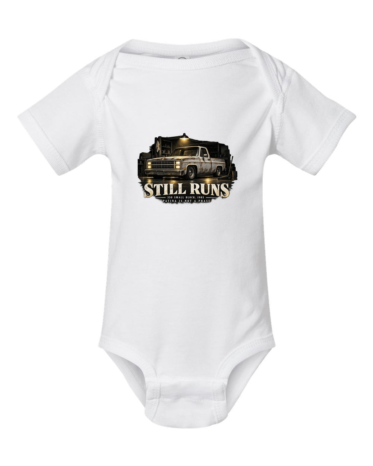 Night garage print of a 1973-87 Chevrolet C10 Squarebody with 350 small block text white baby onesie front view with the design