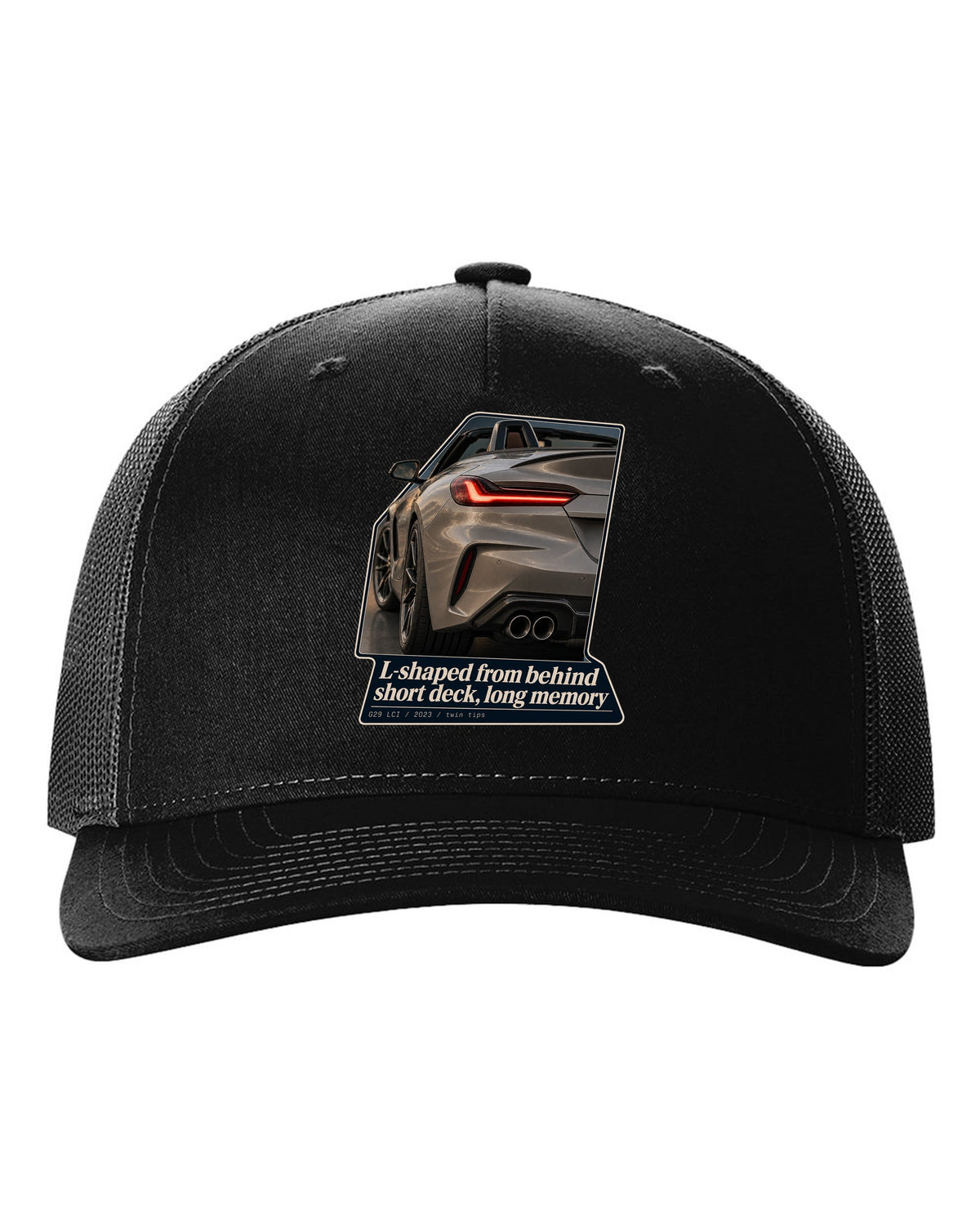 Macro print of the L-shaped taillight on a 2023 BMW Z4 G29 LCI black hat front view with the design