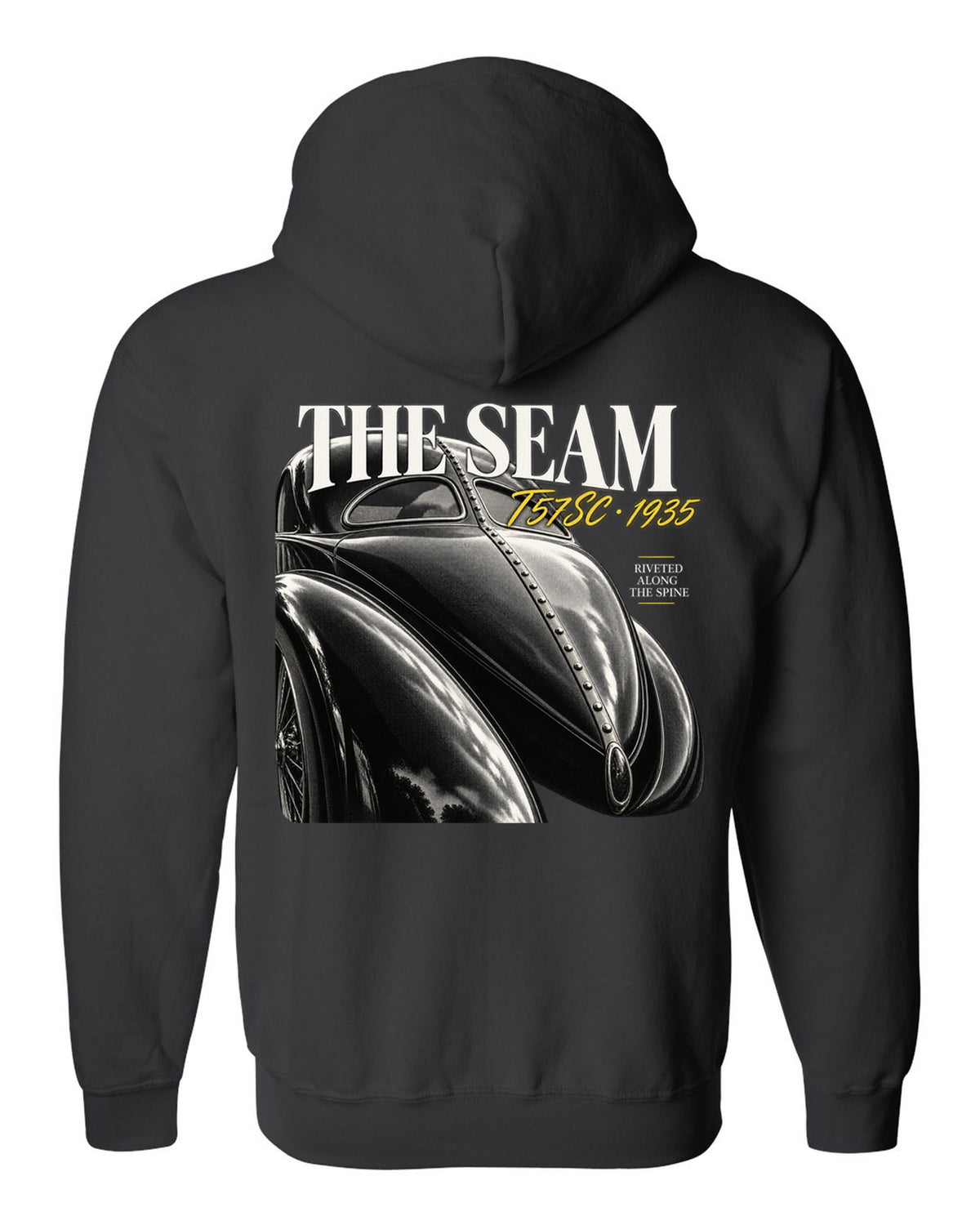 Close macro print of the riveted dorsal seam on a 1935 Bugatti Type 57SC Atlantic black zip hoodie back view with the design