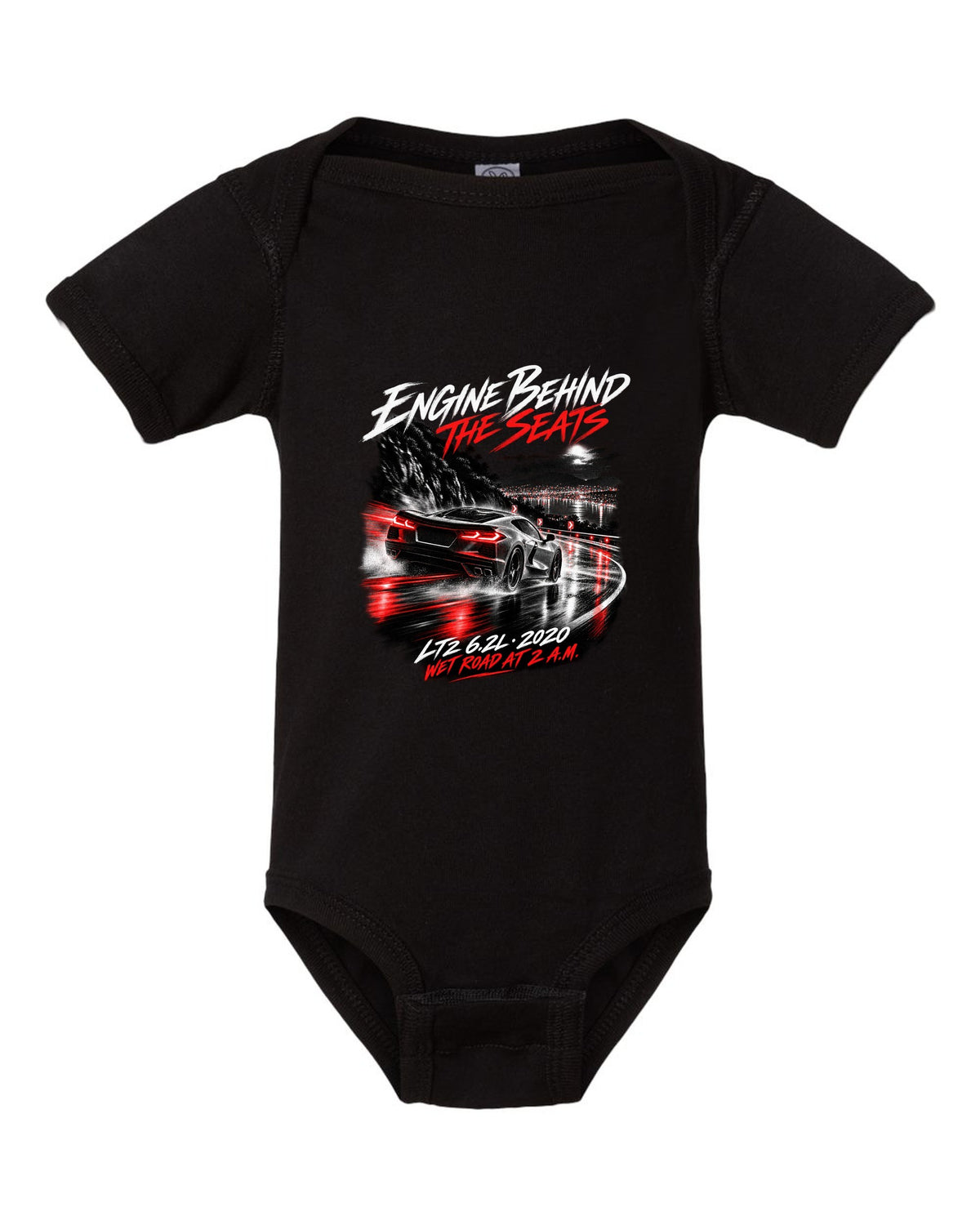 Corvette C8 Stingray driving on a wet road at night black baby onesie front view with the design