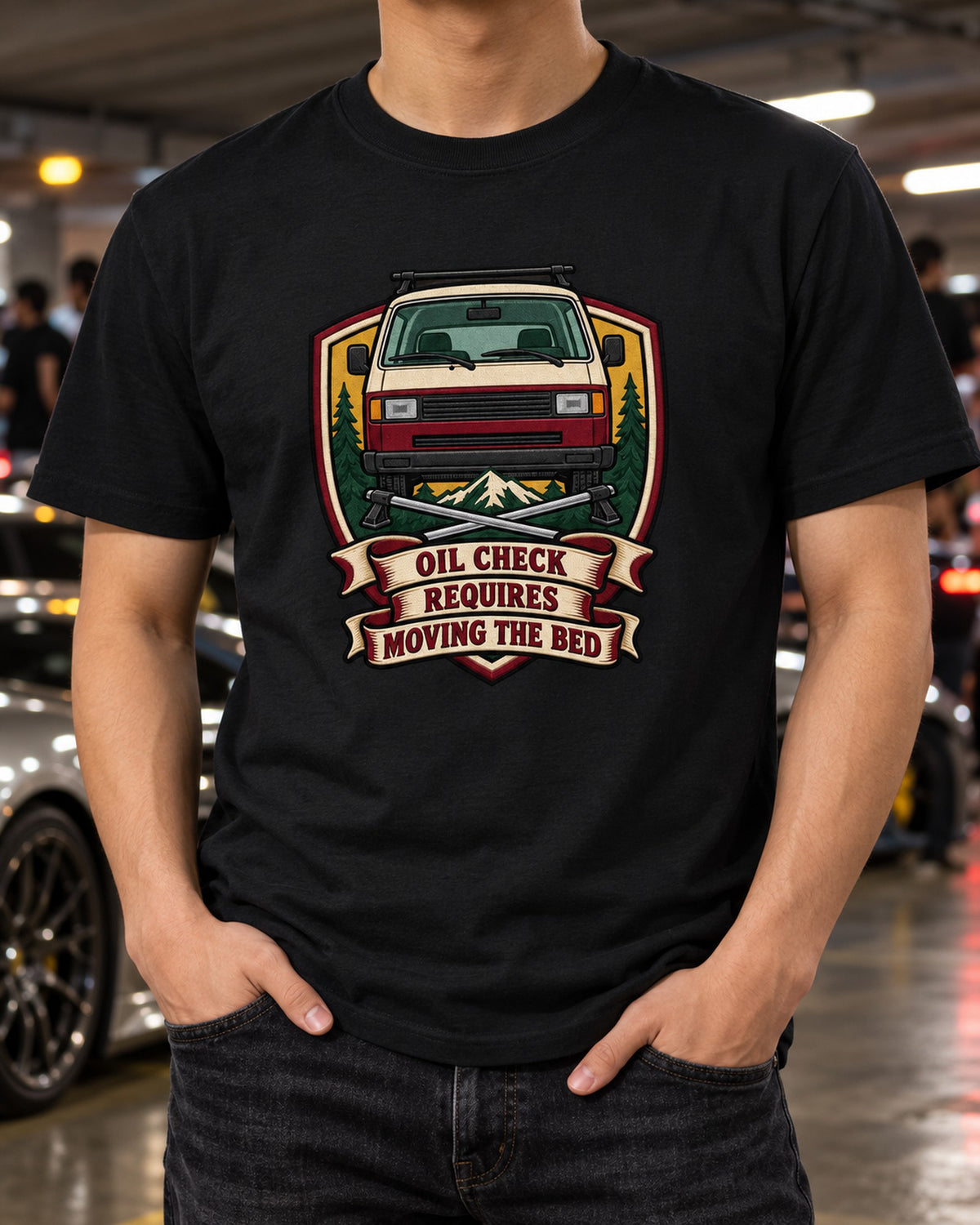 VW T3 Vanagon Varsity Crest Tee, Oil Check Requires Moving Bed T-Shirt Black worn hero
