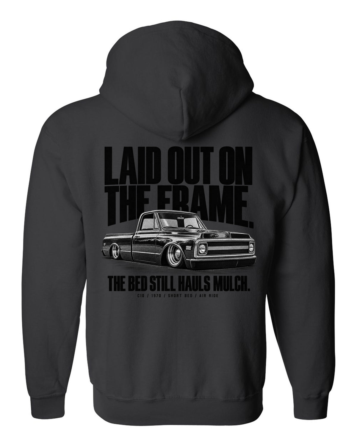 Halftone print of a 1970 Chevrolet C10 short bed on air ride with laid out on the frame text black zip hoodie back view with the design