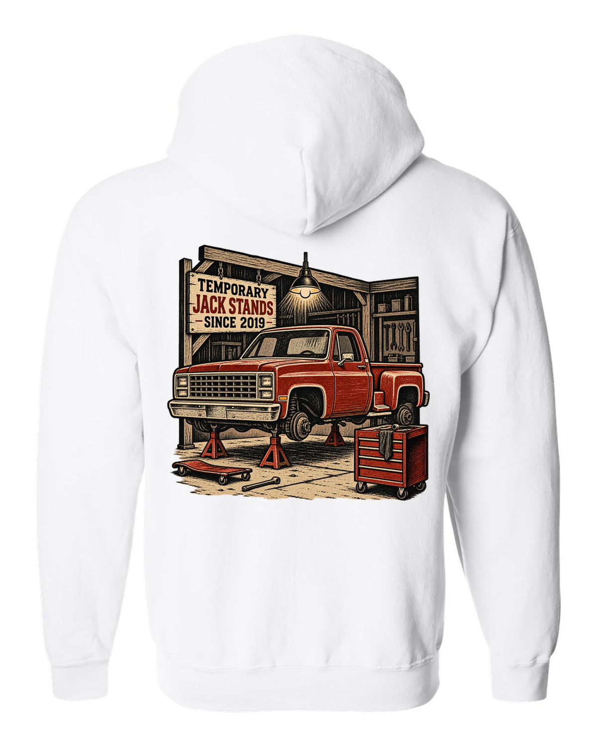 Linocut woodcut style print of a 1973-87 Chevrolet C10 Squarebody Stepside in a workshop with jack stands lettering white zip hoodie back view with the design