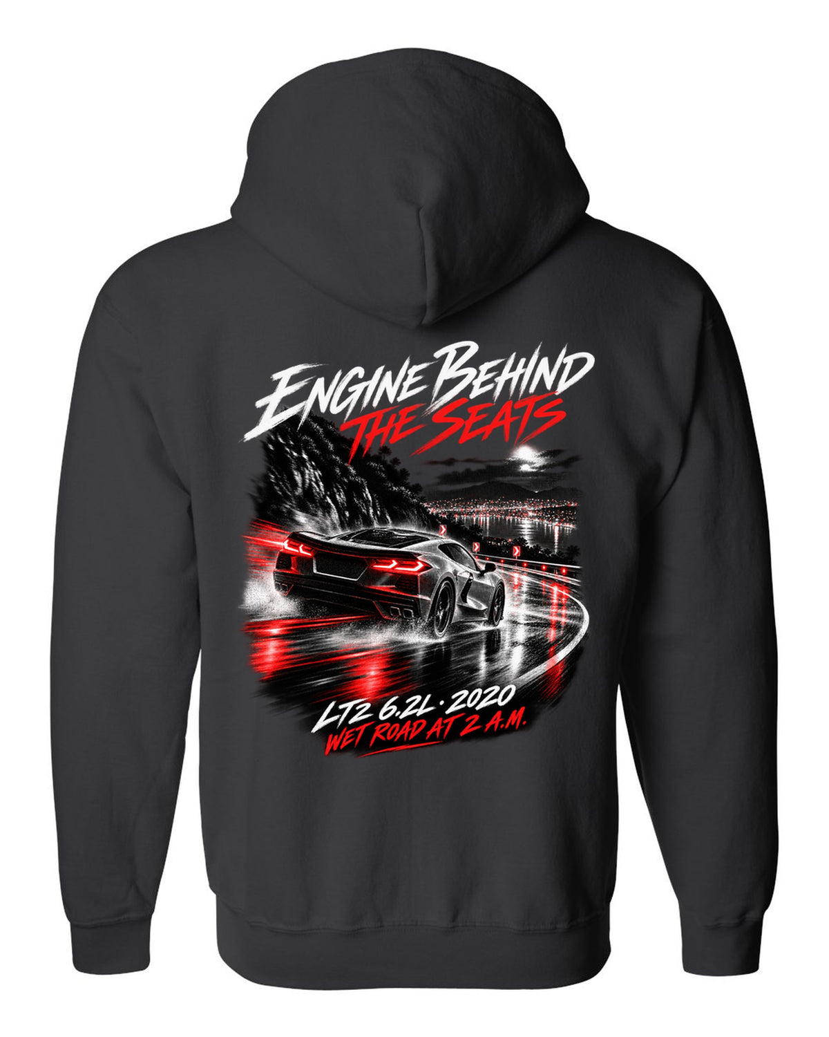 Corvette C8 Stingray driving on a wet road at night black zip hoodie back view with the design