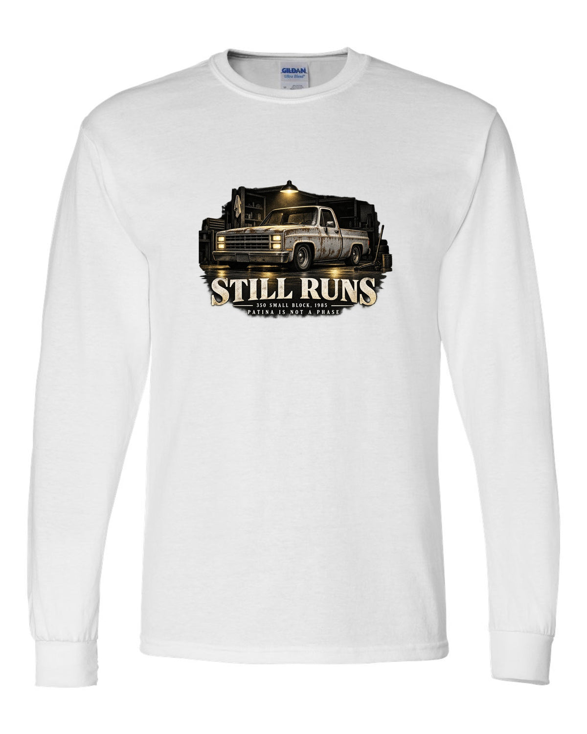 Night garage print of a 1973-87 Chevrolet C10 Squarebody with 350 small block text white long sleeve front view with the design