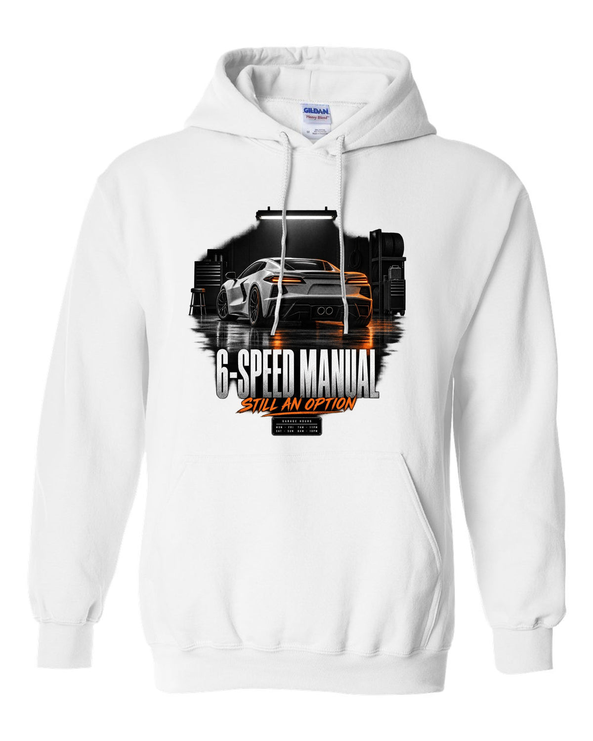 Lotus Emira V6 in a garage at night with 6-speed manual text white pull over hoodie front view with the design