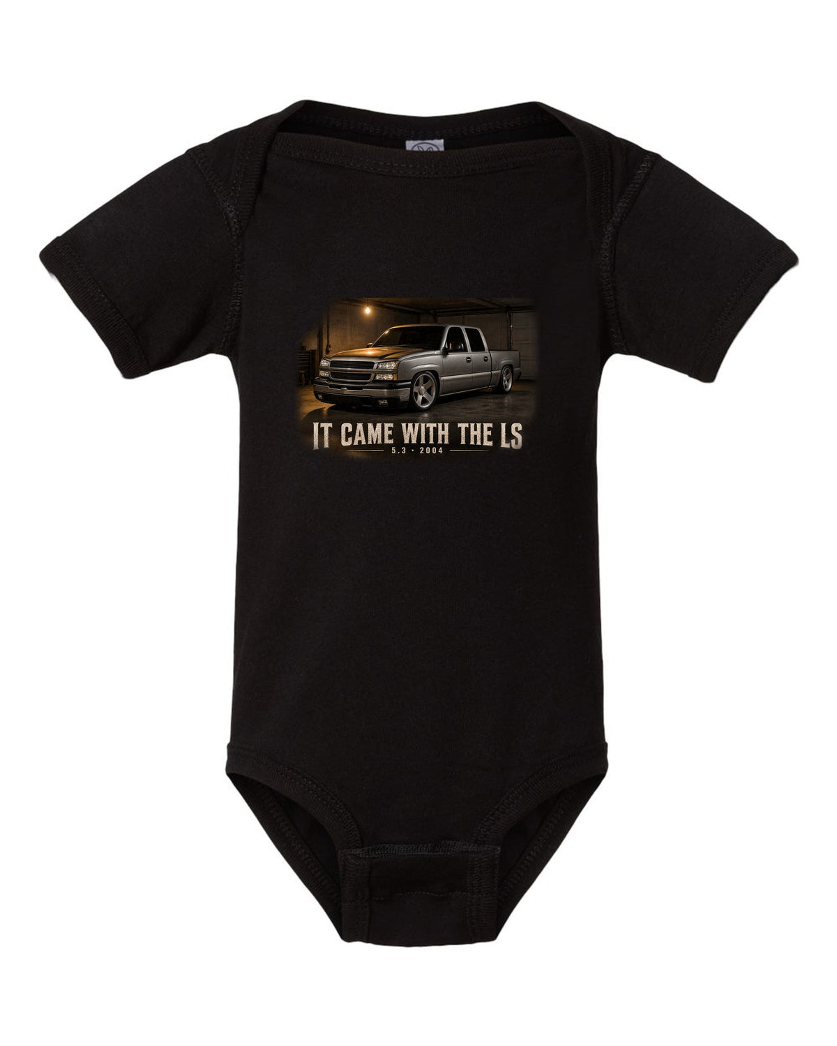 2004 Chevy Silverado crew cab in a garage night scene, print black baby onesie front view with the design