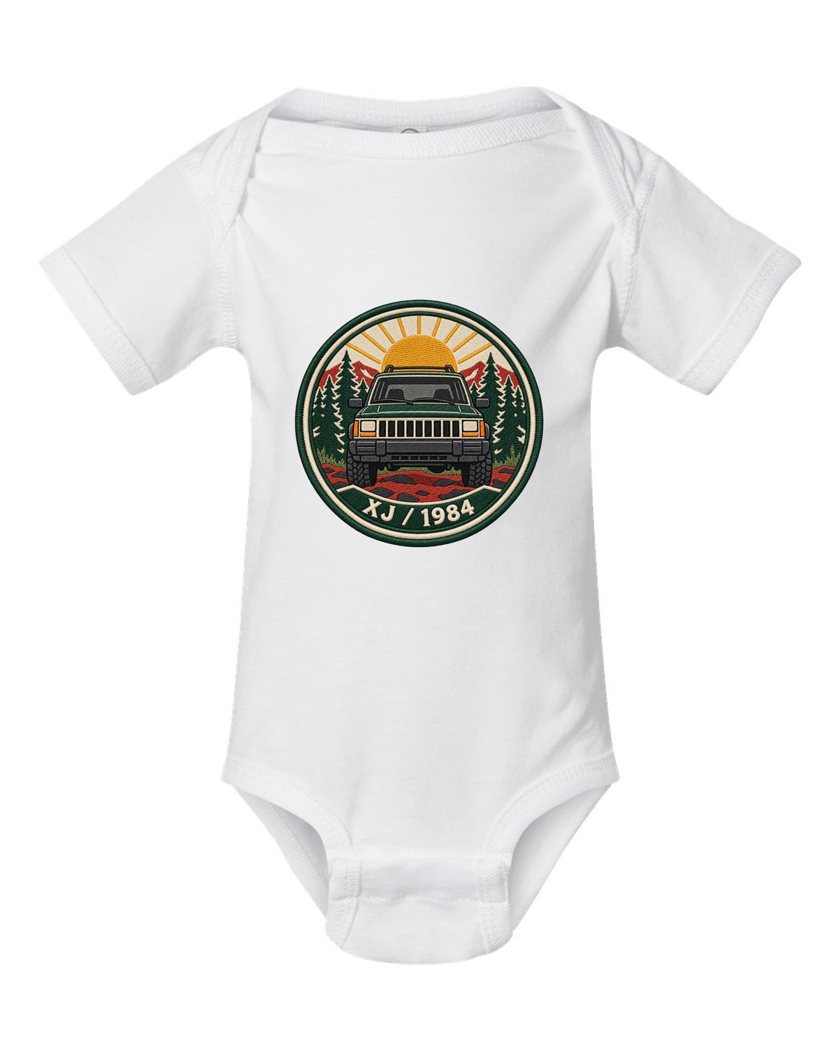 Round embroidered-style crest print of a boxy Jeep Cherokee XJ with XJ 1984 text white baby onesie front view with the design