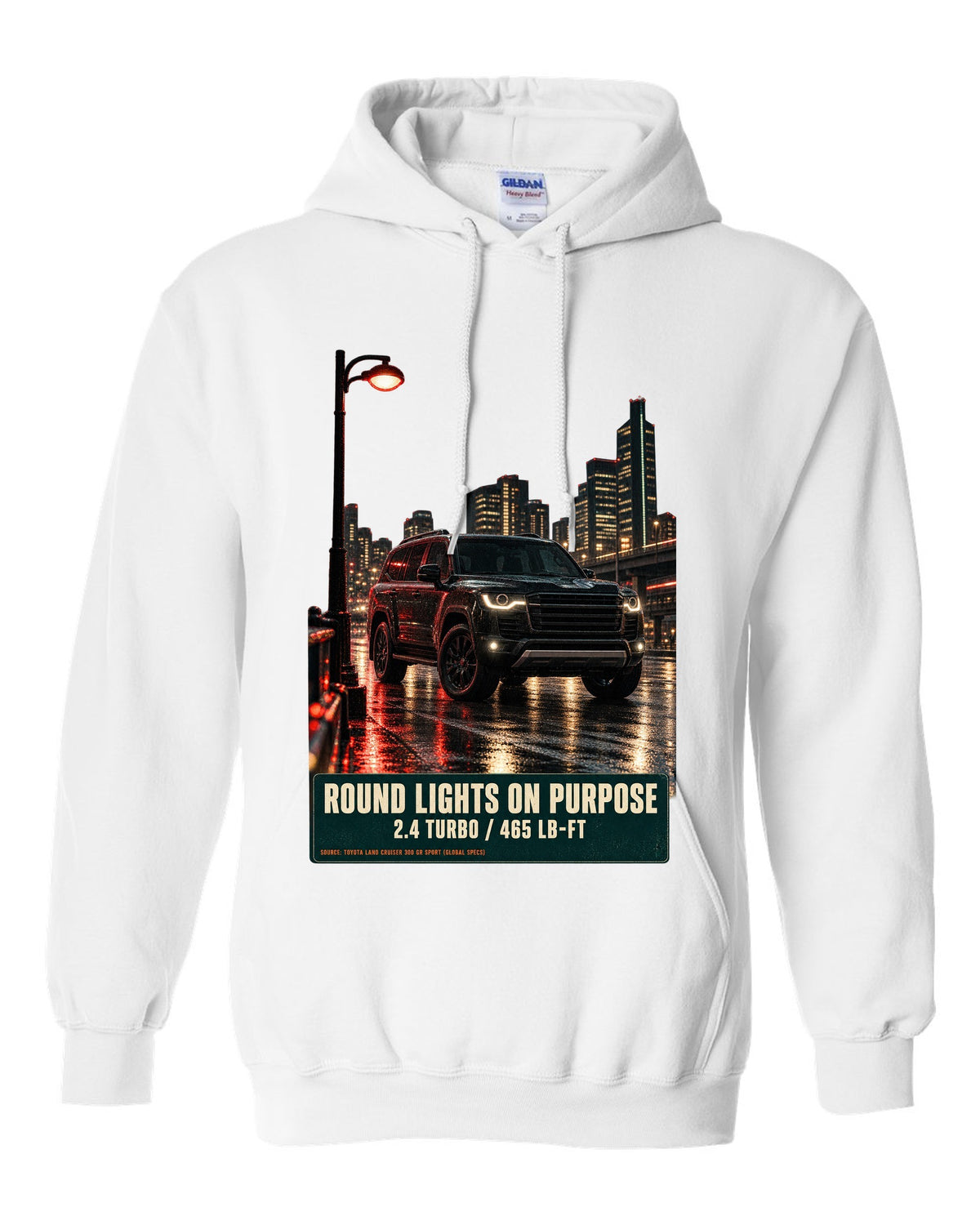 Toyota Land Cruiser 250 First Edition on a mountain pass at night white pull over hoodie front view with the design