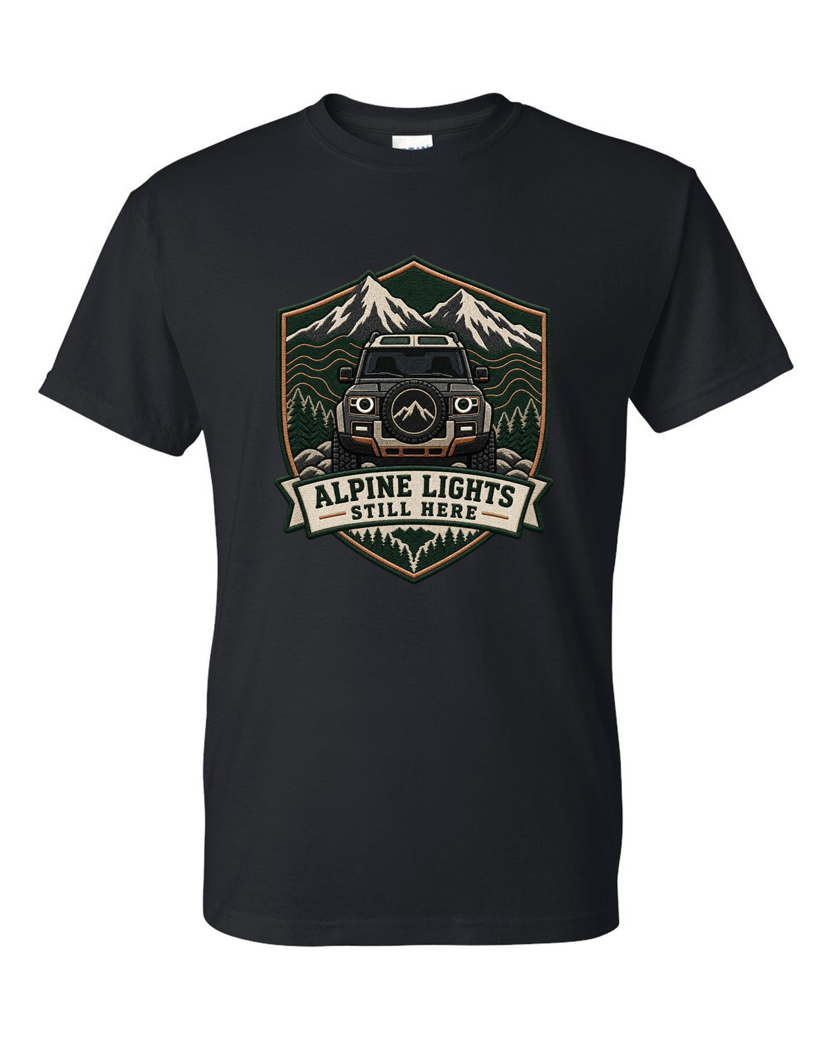 Original shield crest print for a Land Rover Defender L663 with Alpine Lights Still Here text black t-shirt front view with the design