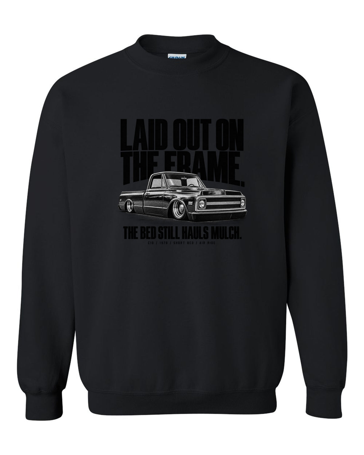Halftone print of a 1970 Chevrolet C10 short bed on air ride with laid out on the frame text black crewneck front view with the design