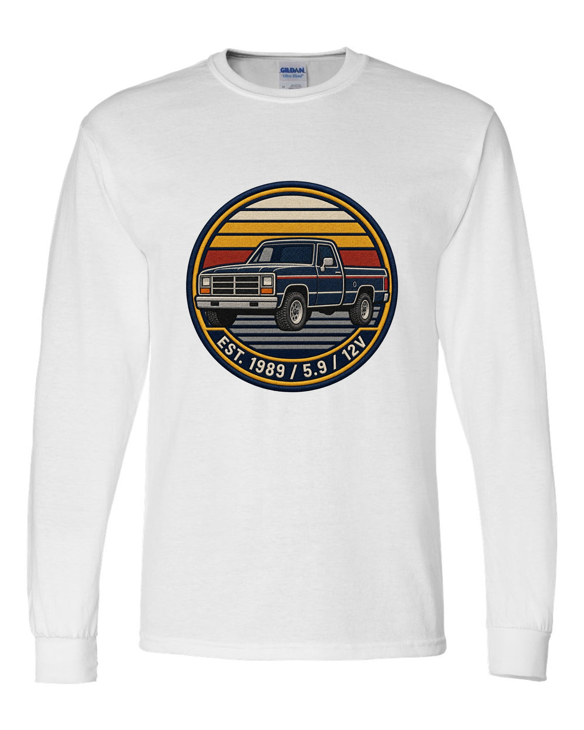 Varsity-style grille crest print of a 1989-1993 Dodge Ram 1st gen with Est. 1989 5.9 12V text white long sleeve front view with the design