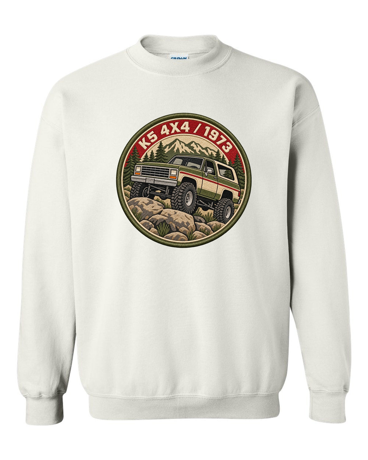Embroidery-style varsity crest print of a 1973-91 Chevrolet K5 Blazer with K5 4x4 1973 lettering white crewneck front view with the design
