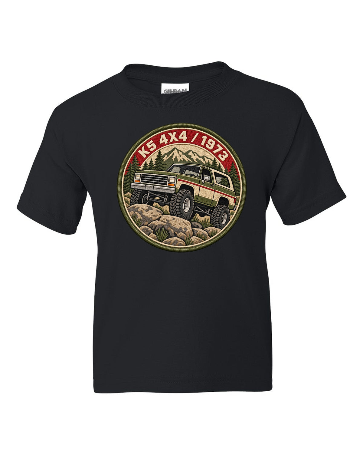 Embroidery-style varsity crest print of a 1973-91 Chevrolet K5 Blazer with K5 4x4 1973 lettering black kids tee front view with the design