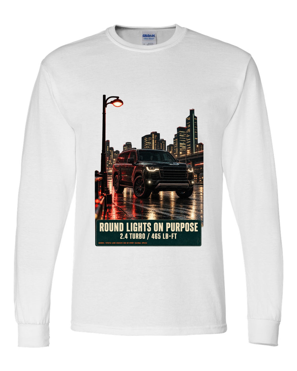 Toyota Land Cruiser 250 First Edition on a mountain pass at night white long sleeve front view with the design