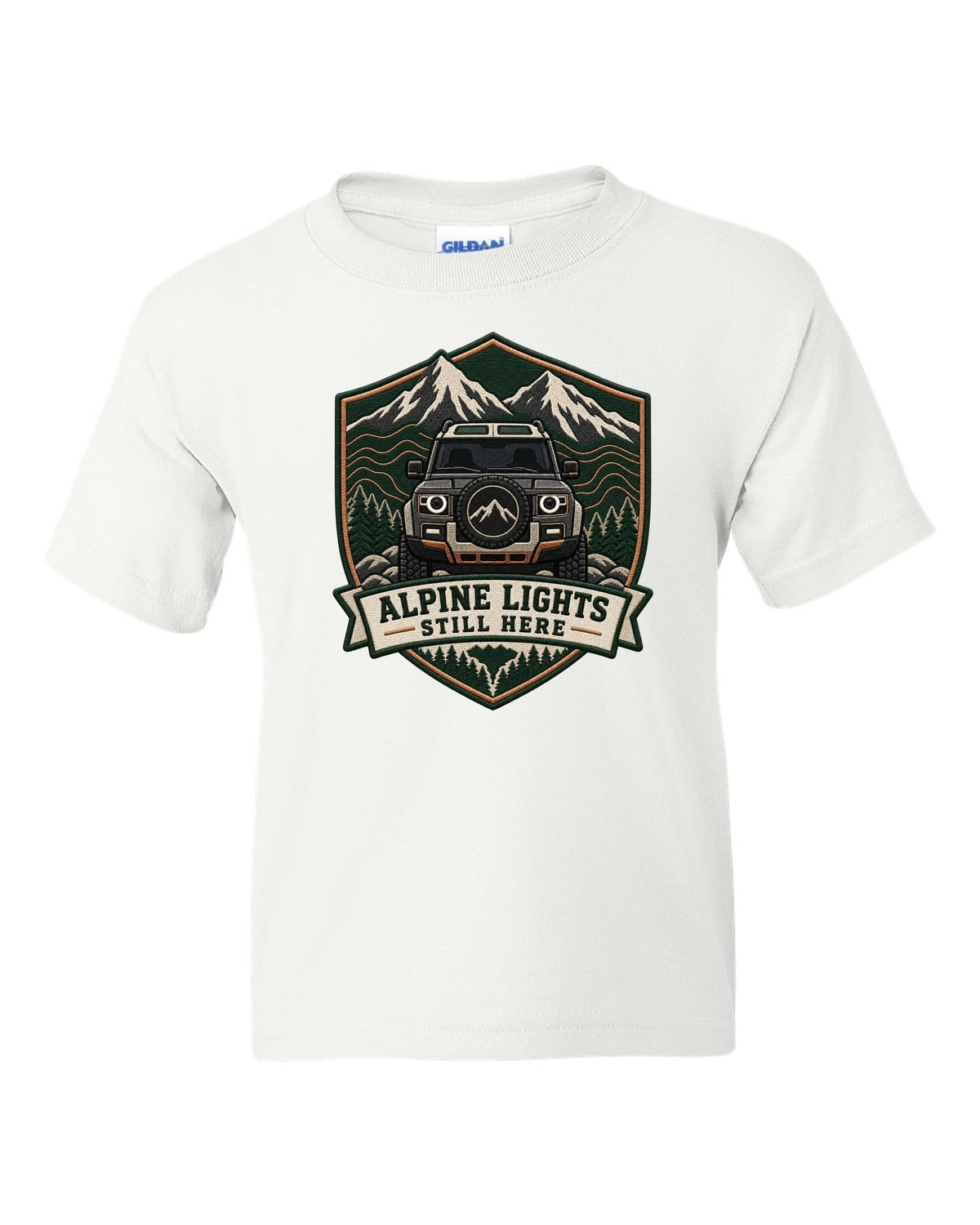 Original shield crest print for a Land Rover Defender L663 with Alpine Lights Still Here text white kids tee front view with the design