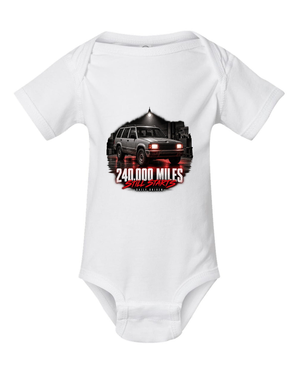 Jeep Cherokee XJ at night with daily driven 240,000 miles print white baby onesie front view with the design
