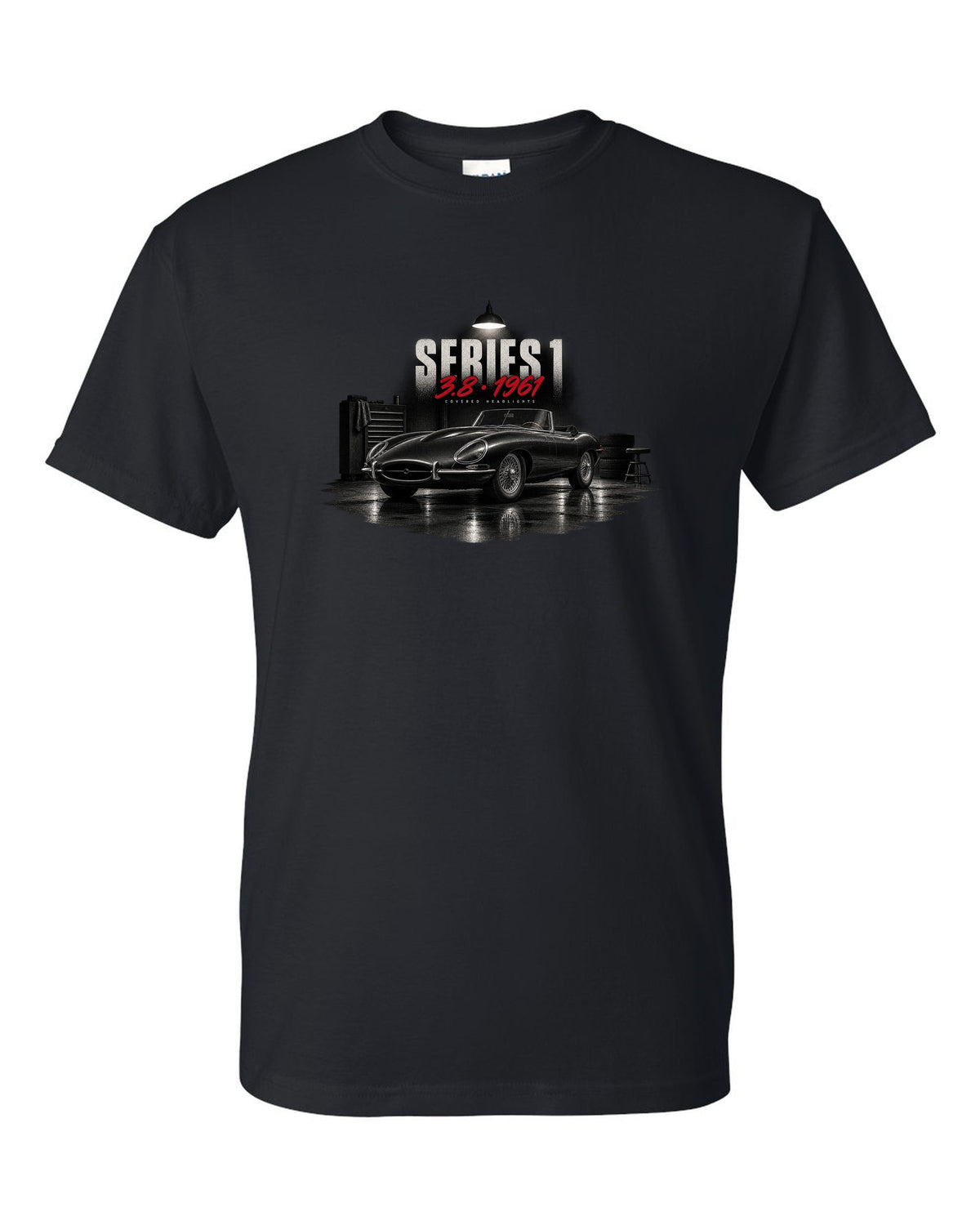 Garage night print of a 1961 Jaguar E-Type Series 1 3.8 with covered headlights and wire wheels black t-shirt front view with the design