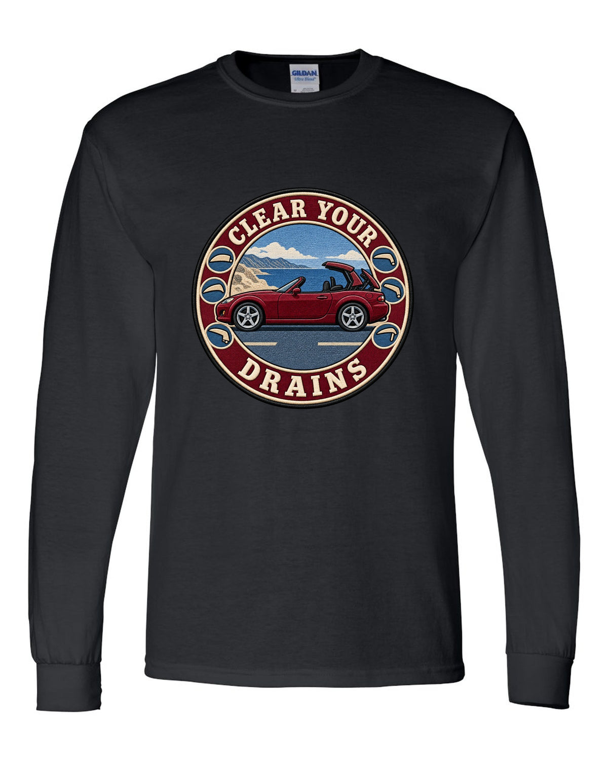 Embroidery-style roundel crest of a Mazda MX-5 NC with clear your drains text black long sleeve front view with the design