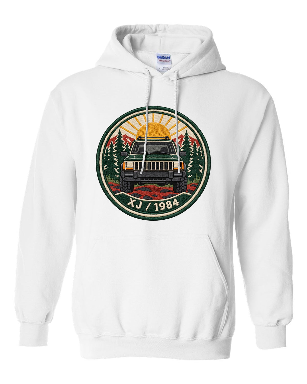 Round embroidered-style crest print of a boxy Jeep Cherokee XJ with XJ 1984 text white pull over hoodie front view with the design