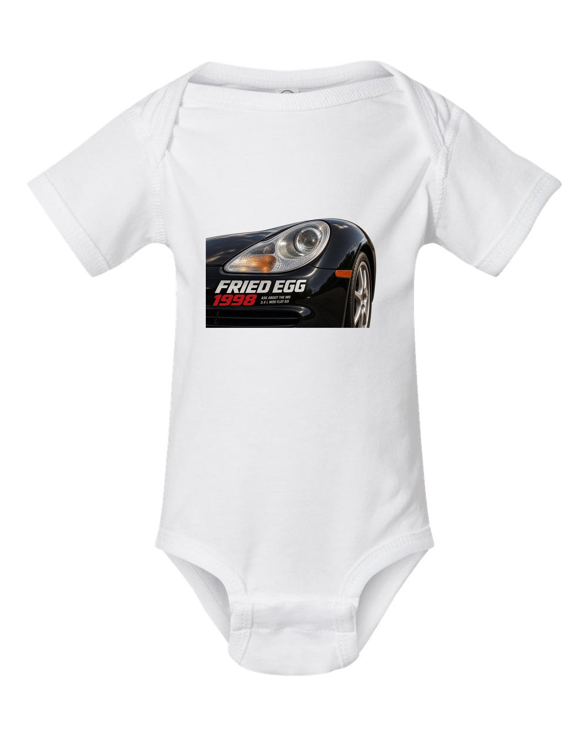 Close-up detail print of the Porsche 911 996 Fried Egg lamp with IMS joke text white baby onesie front view with the design