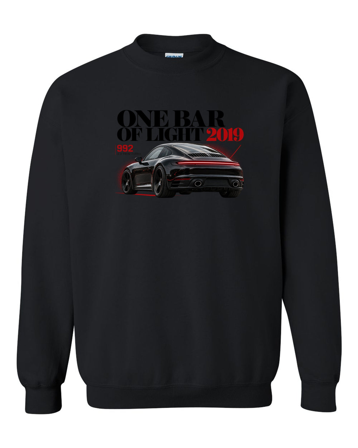 Editorial headline print of a Porsche 911 Carrera S 992 with One Bar Of Light caption black crewneck front view with the design