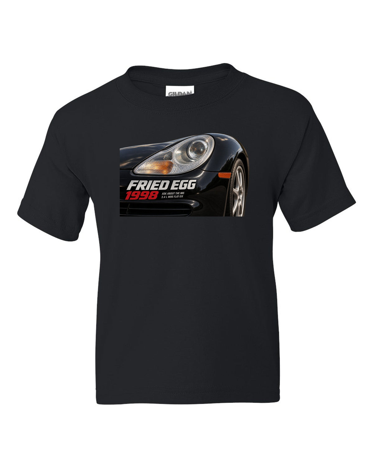 Close-up detail print of the Porsche 911 996 Fried Egg lamp with IMS joke text black kids tee front view with the design