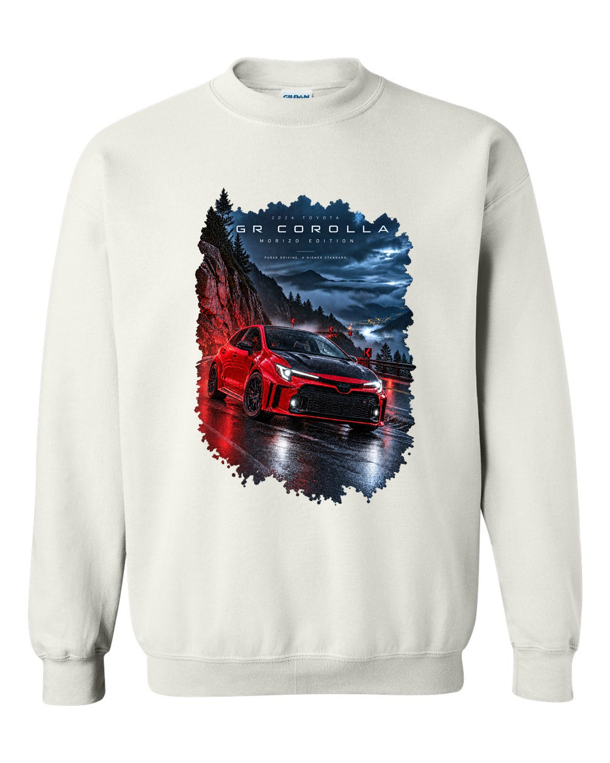 Toyota GR Corolla Morizo Edition on a wet mountain road at night white crewneck front view with the design