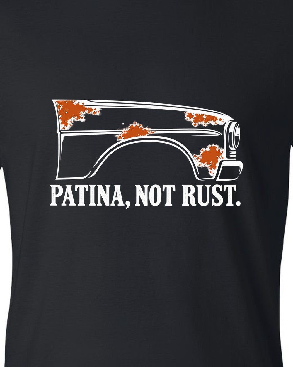 Front fender outline with four rust-orange spots black t-shirt close-up
