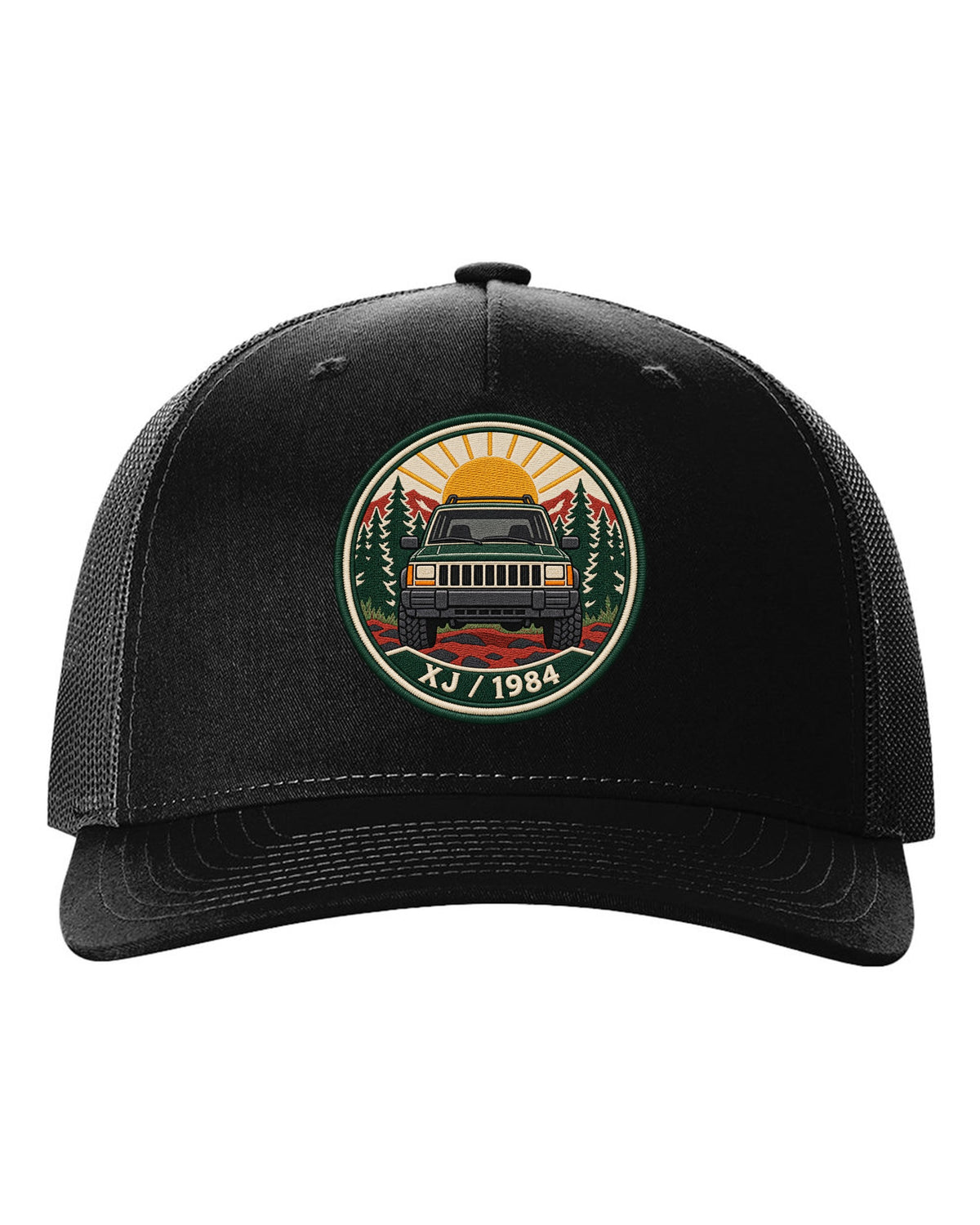 Round embroidered-style crest print of a boxy Jeep Cherokee XJ with XJ 1984 text black hat front view with the design
