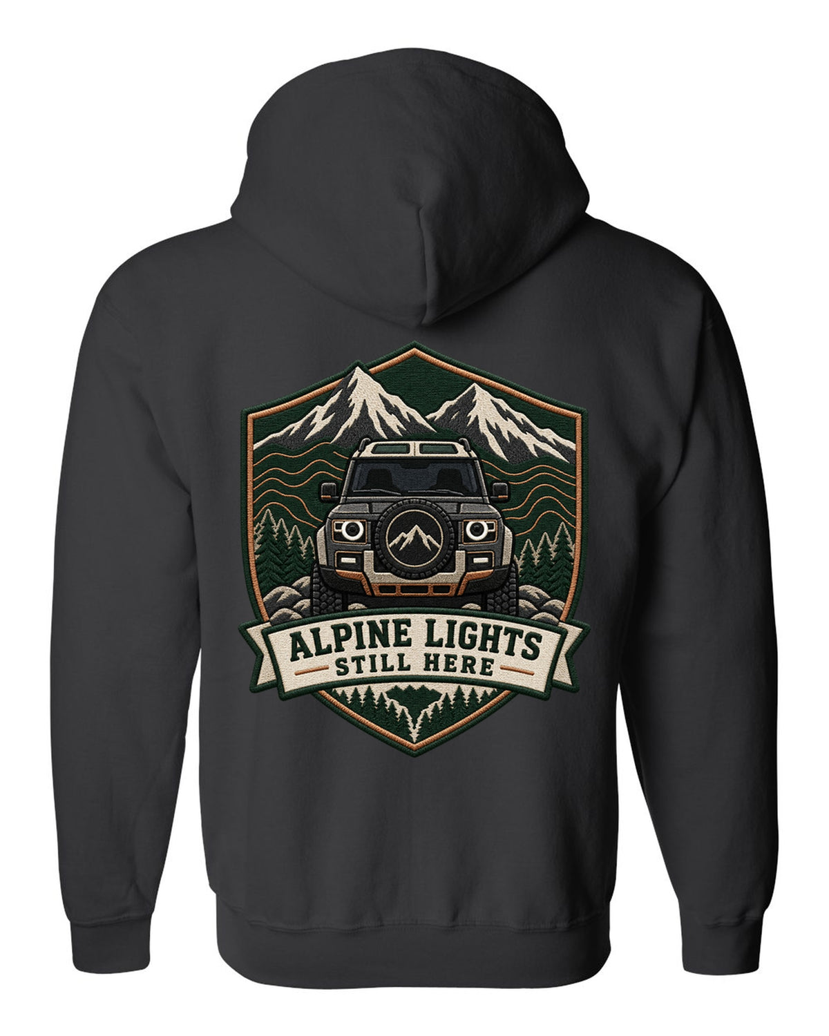 Original shield crest print for a Land Rover Defender L663 with Alpine Lights Still Here text black zip hoodie back view with the design