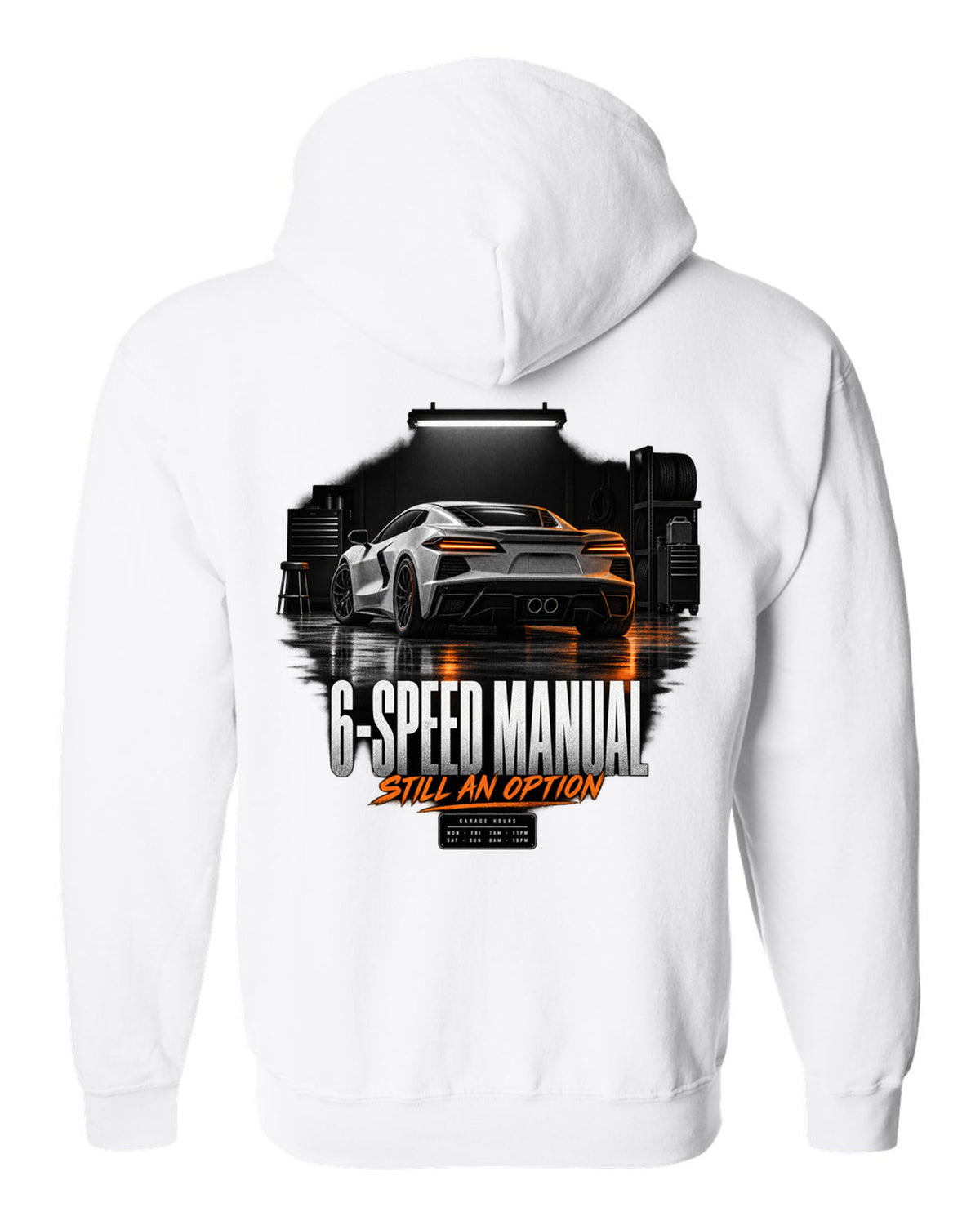 Lotus Emira V6 in a garage at night with 6-speed manual text white zip hoodie back view with the design