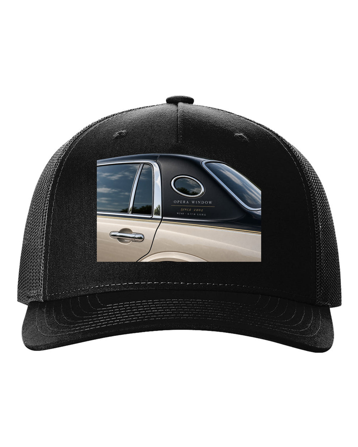 Detail macro print of a Maybach 62 W240 opera window with Since 2002 lettering black hat front view with the design