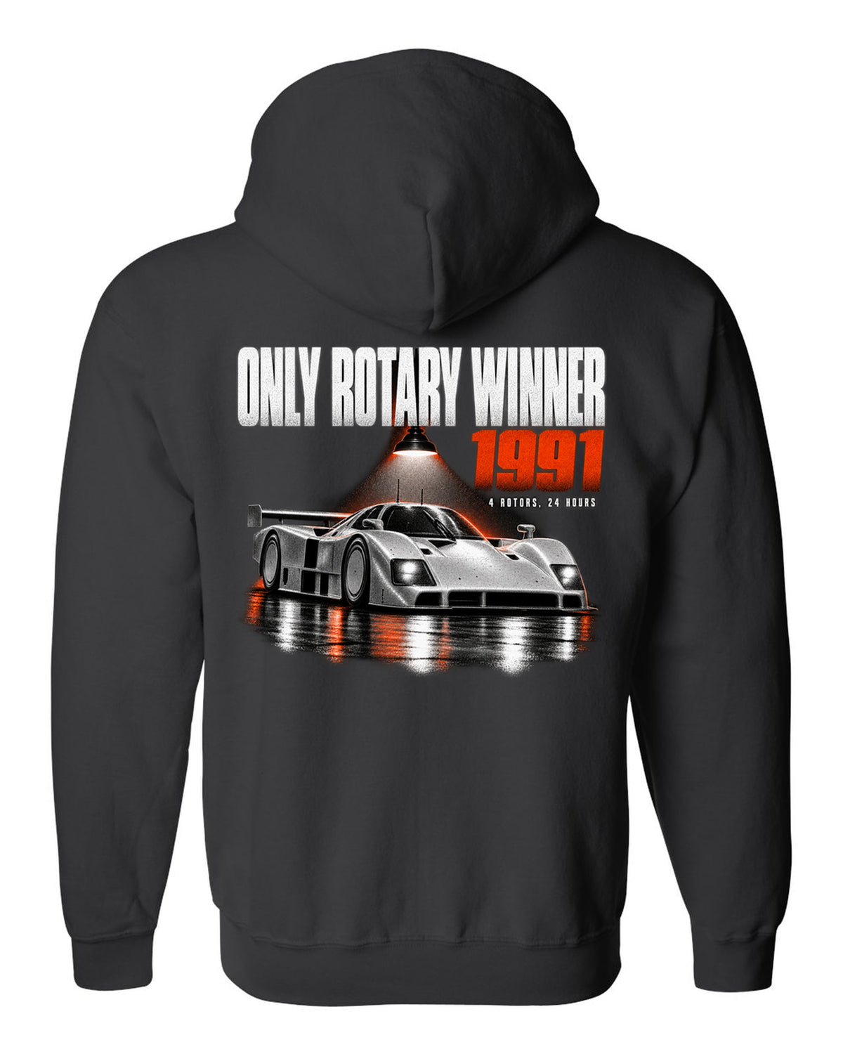Mazda 787B in a dark garage with only rotary winner 1991 lettering black zip hoodie back view with the design