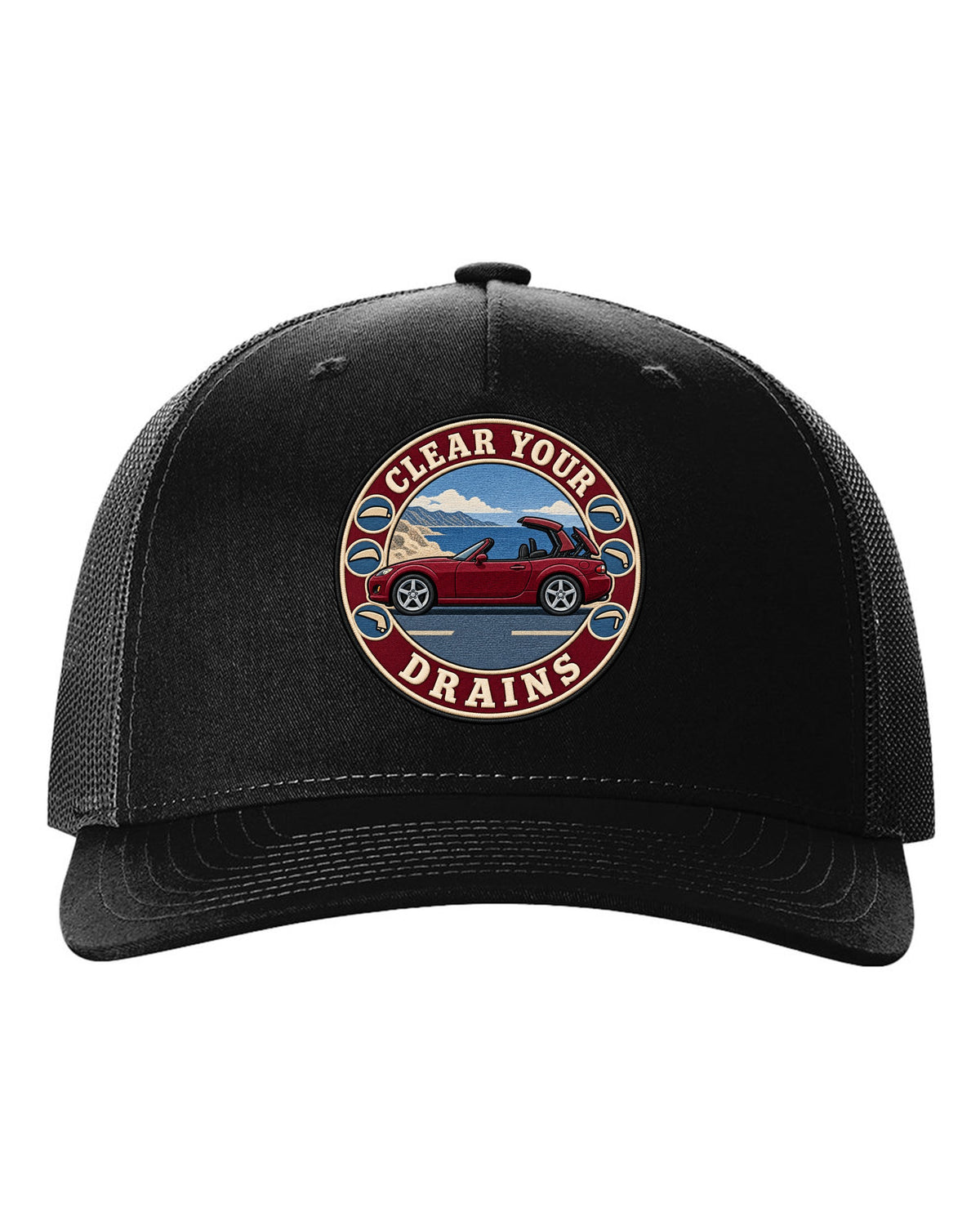 Embroidery-style roundel crest of a Mazda MX-5 NC with clear your drains text black hat front view with the design