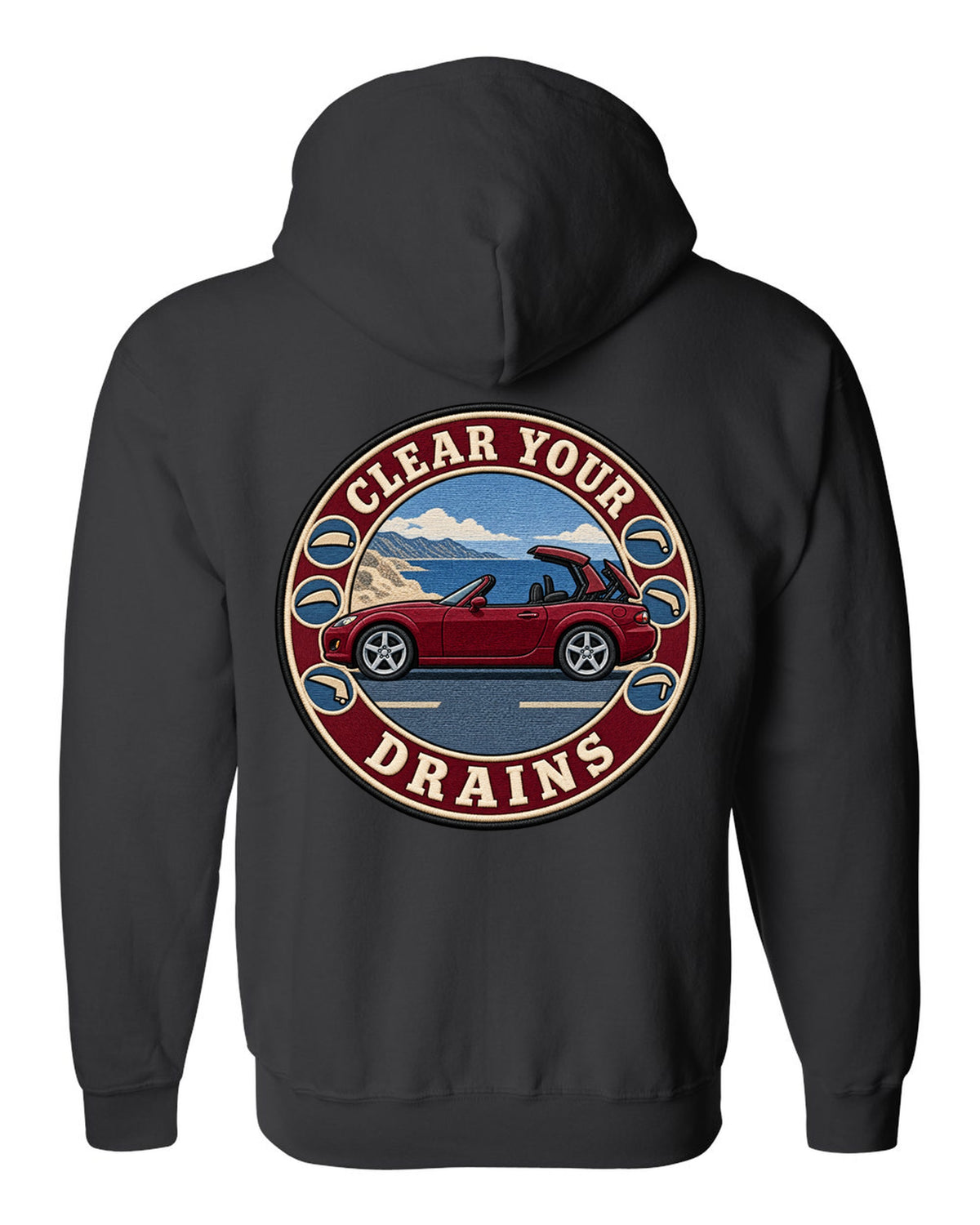Embroidery-style roundel crest of a Mazda MX-5 NC with clear your drains text black zip hoodie back view with the design