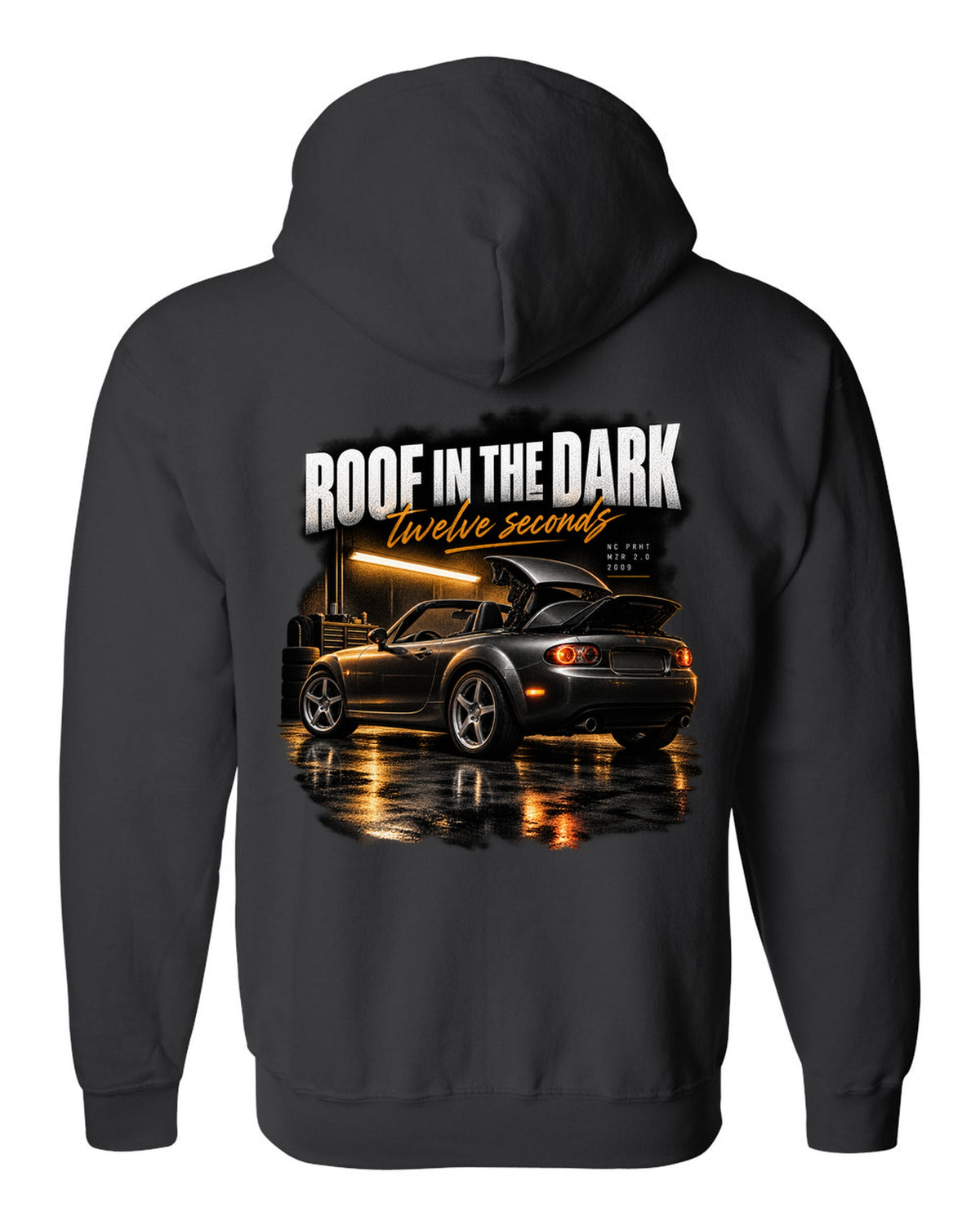 Garage night print of a Mazda MX-5 NC PRHT with the roof folding black zip hoodie back view with the design