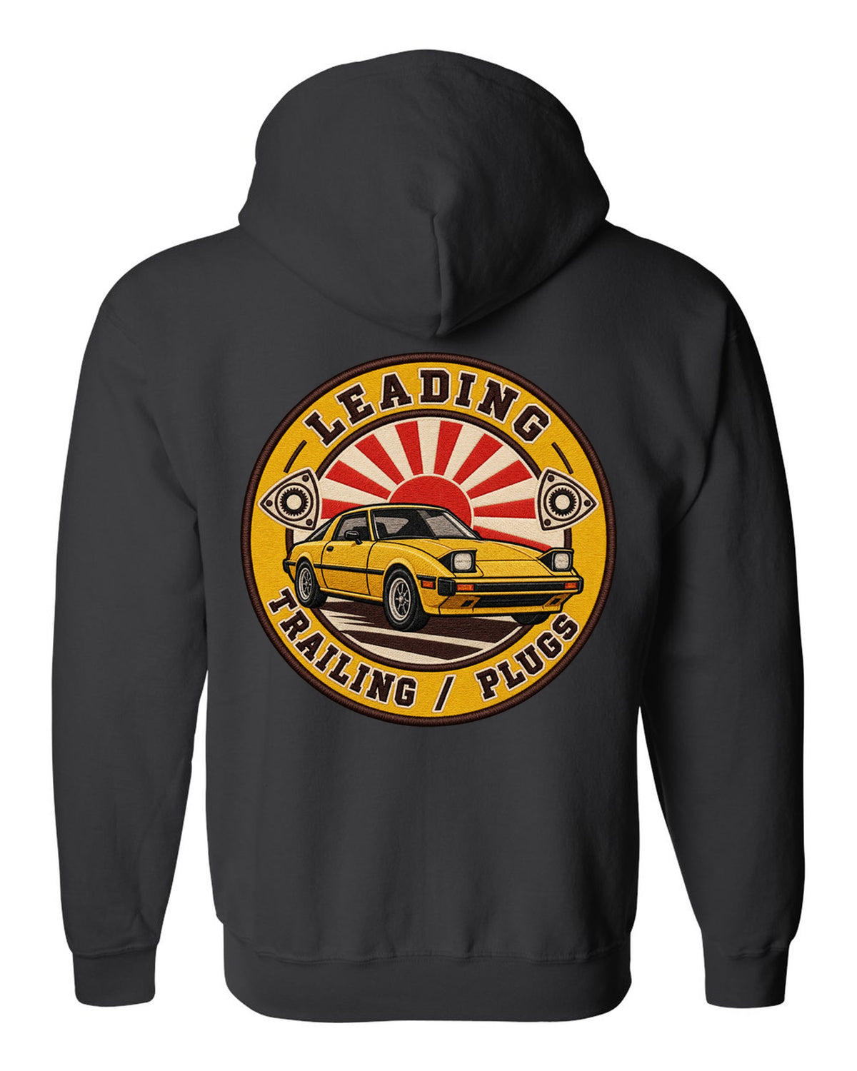Embroidery-style roundel crest of a Mazda RX-7 SA22C with rotary plug text black zip hoodie back view with the design