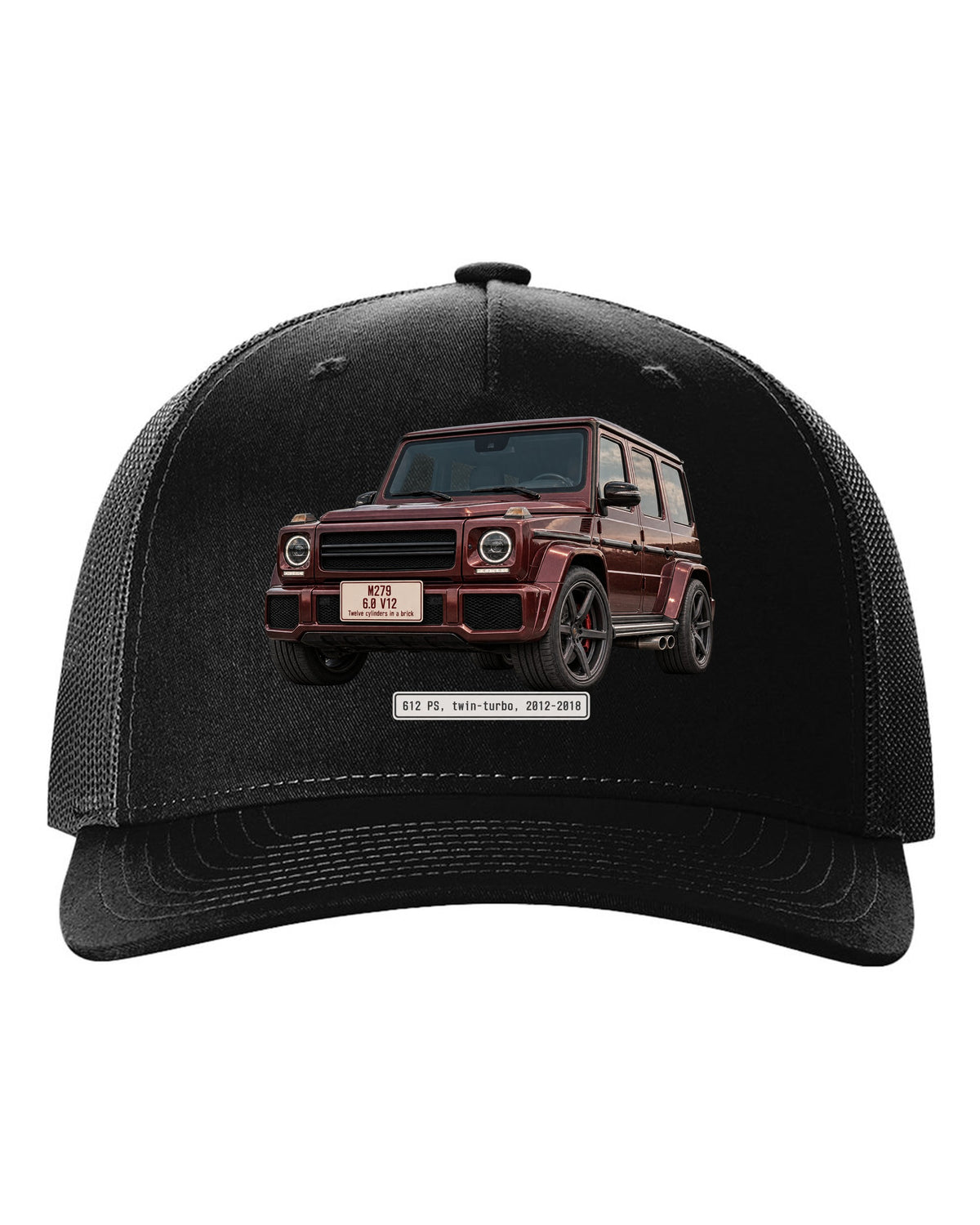 Editorial headline print of a Mercedes-AMG G65 W463 V12 black hat front view with the design